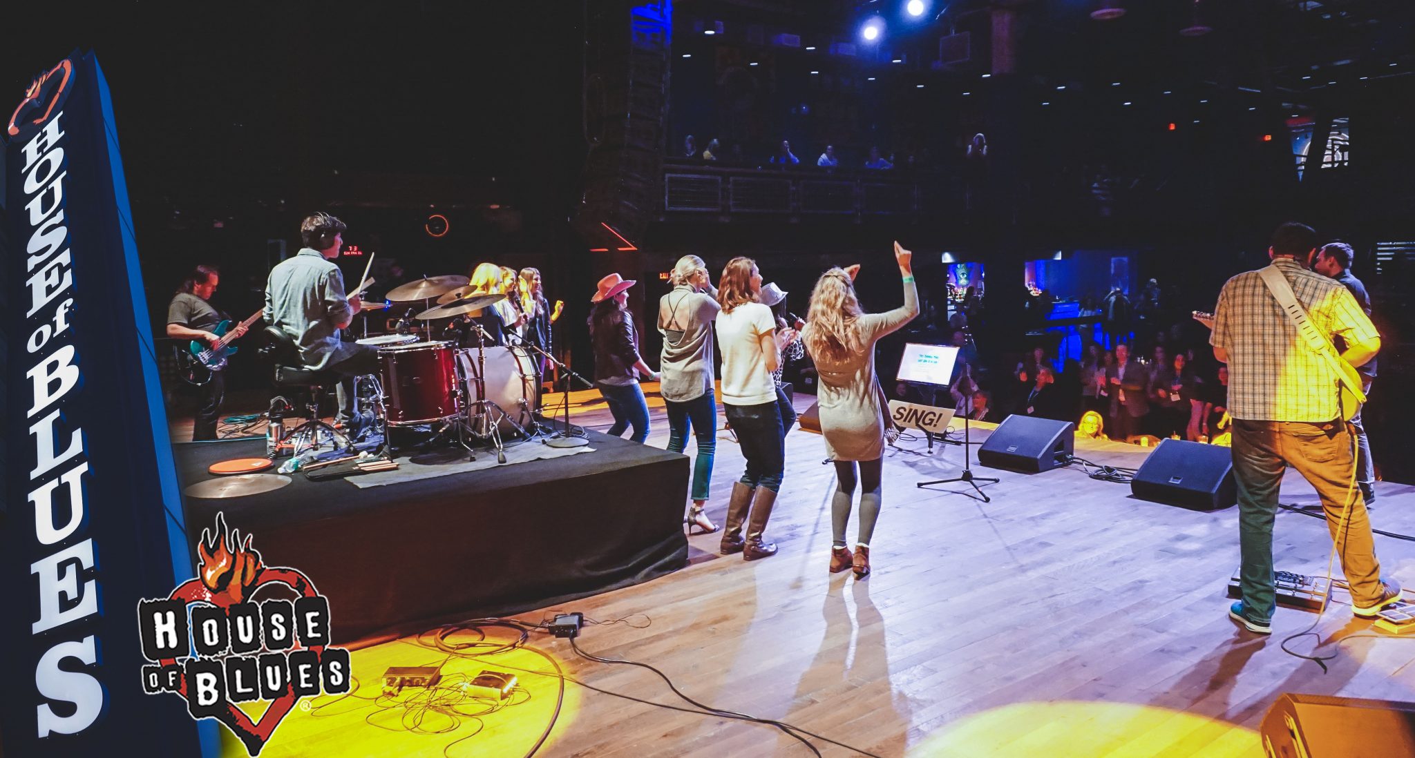 Massive crowd watching a live band karaoke concert at House of Blues