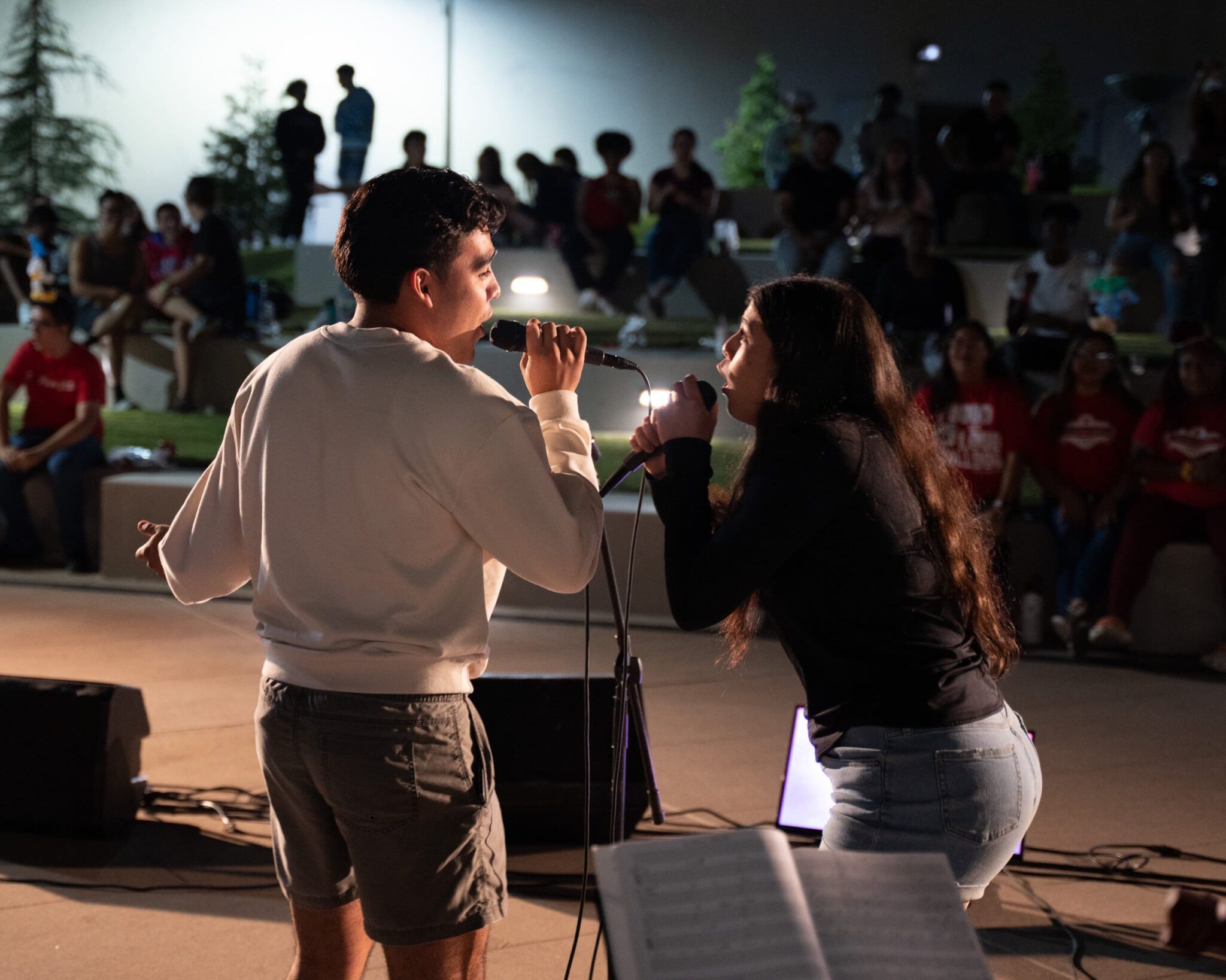 Wide angle shot of a live band karaoke concert in action
