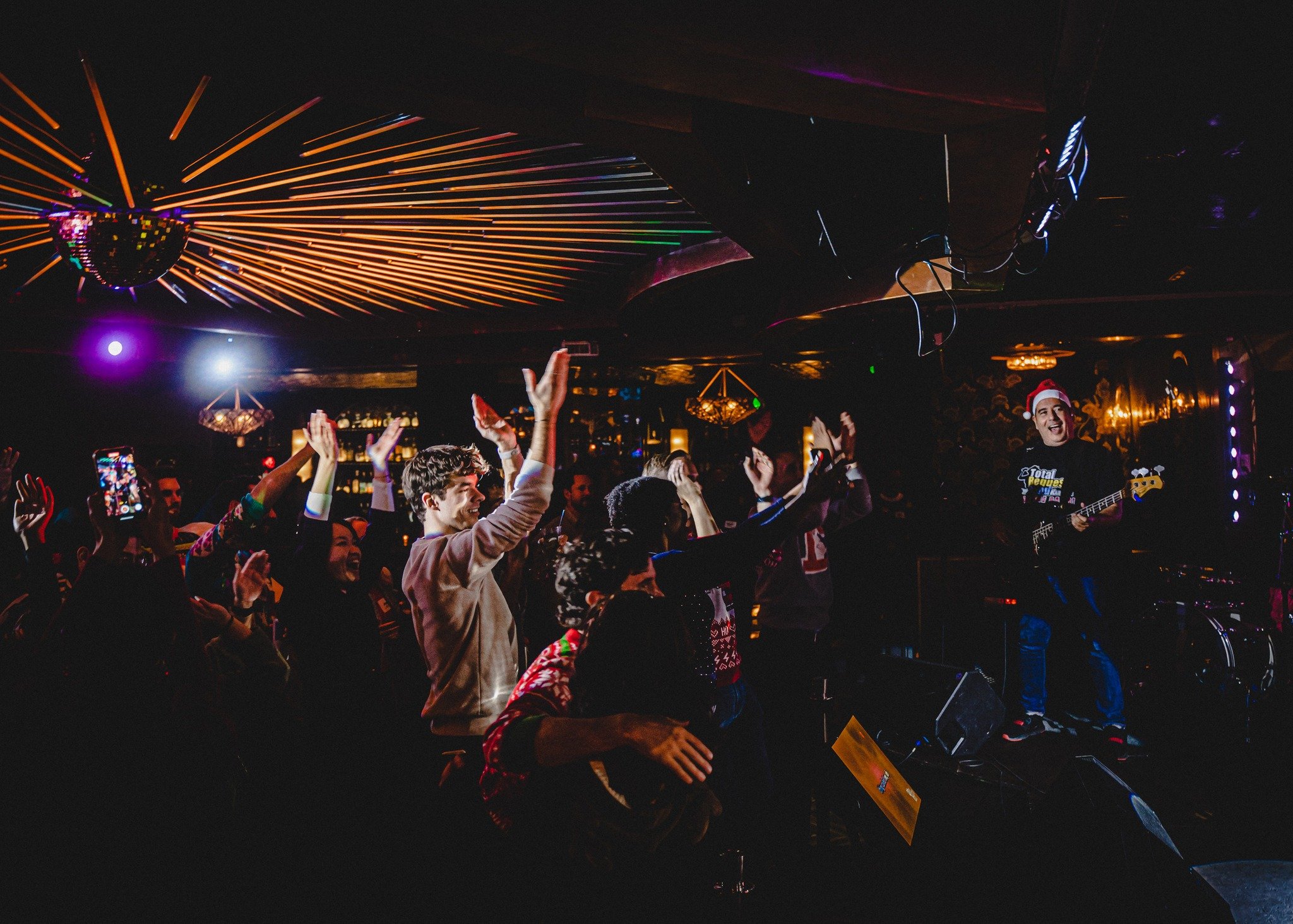Exciting stage atmosphere at a live band karaoke party
